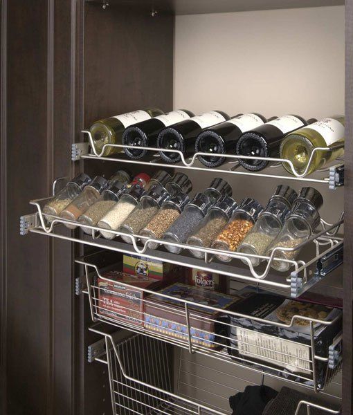 A pantry filled with bottles of wine and spices