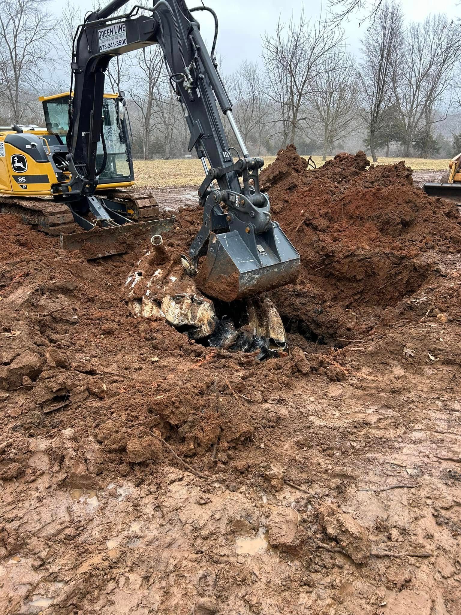 Family gathered at a dining table in a kitchen. They are eating and talking together.