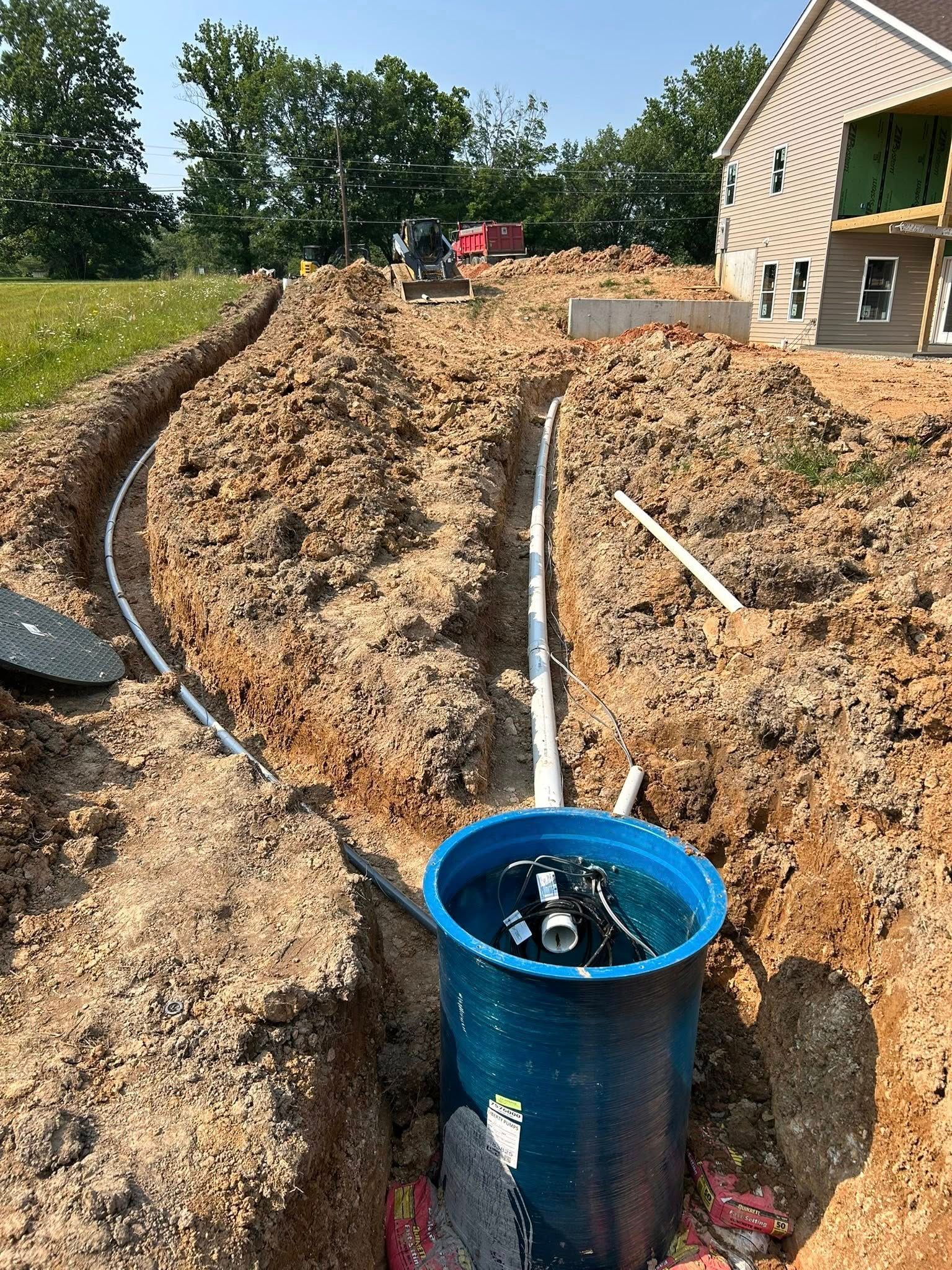 A person holding a baby up in the air indoors near a window, baby smiling.