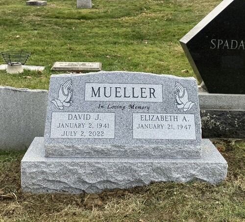 Headstone for David J. Mueller (1941-2022) and Elizabeth A. Mueller (1947) in a cemetery.
