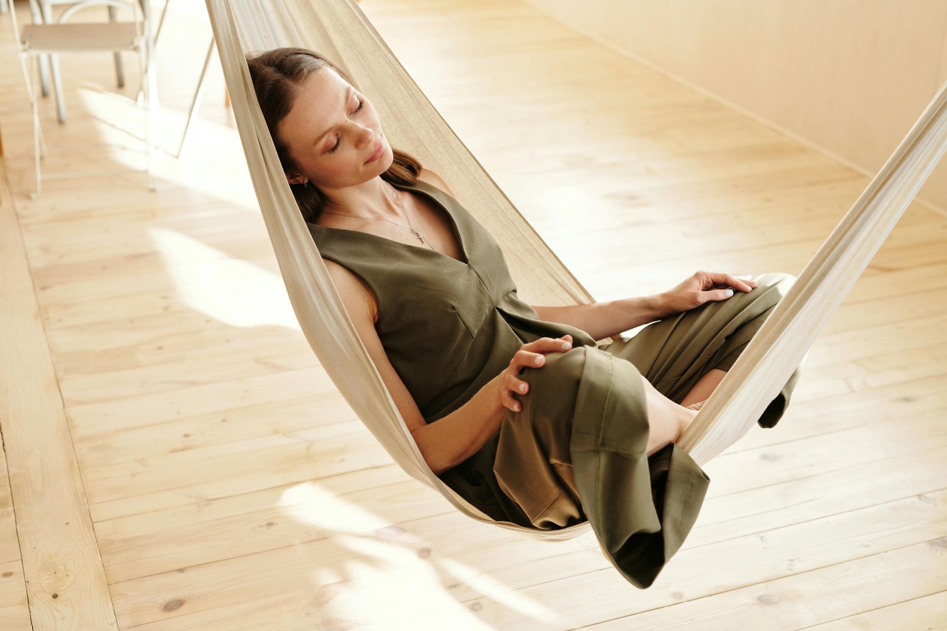 woman relaxing in hammock