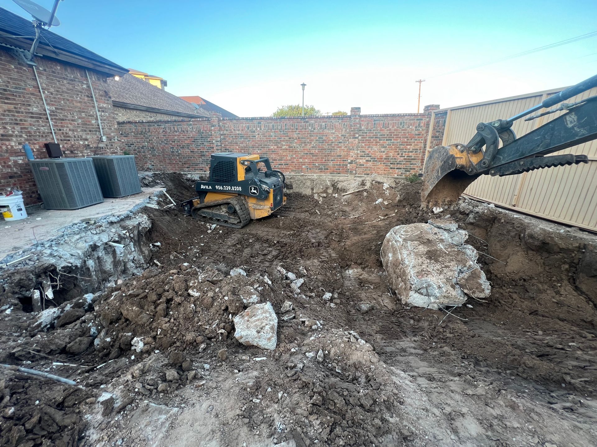 Backyard concrete slab removal in the Rio Grande Valley, TX.