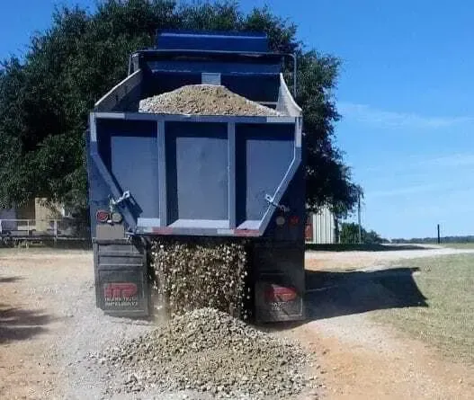 Caliche gravel driveway construction near Weslaco, TX.