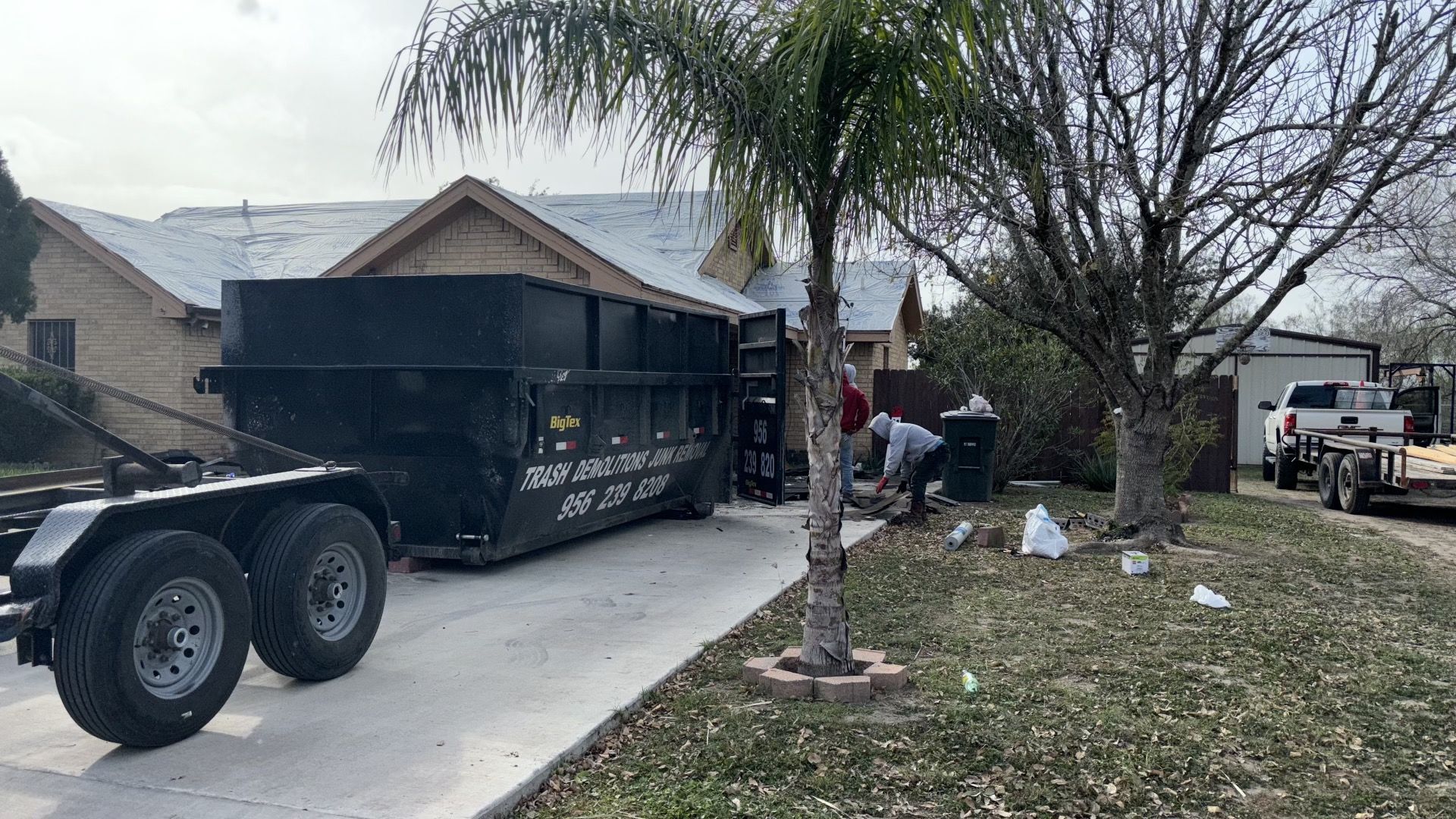 Roll off container dropped off in a driveway in McAllen, TX. 