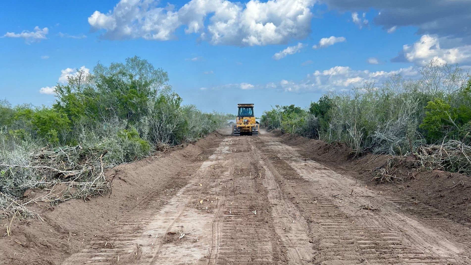 Bulldozer clearing a road in Starr County, Texas.