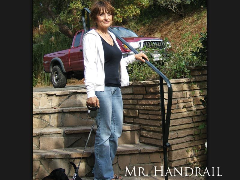 (EX-28) - Caroline grasping Railing - Something elegant and strong to hold onto