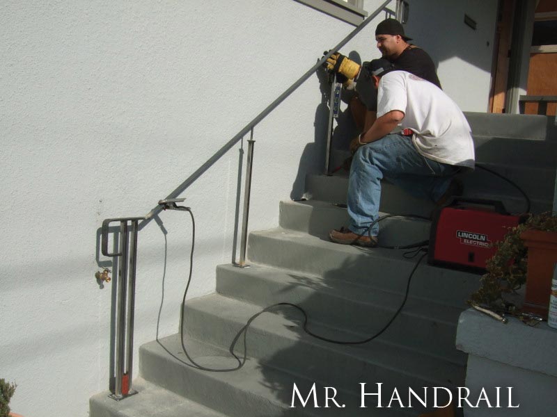 (EX-50) - Handrail on an Arts and Crafts entry