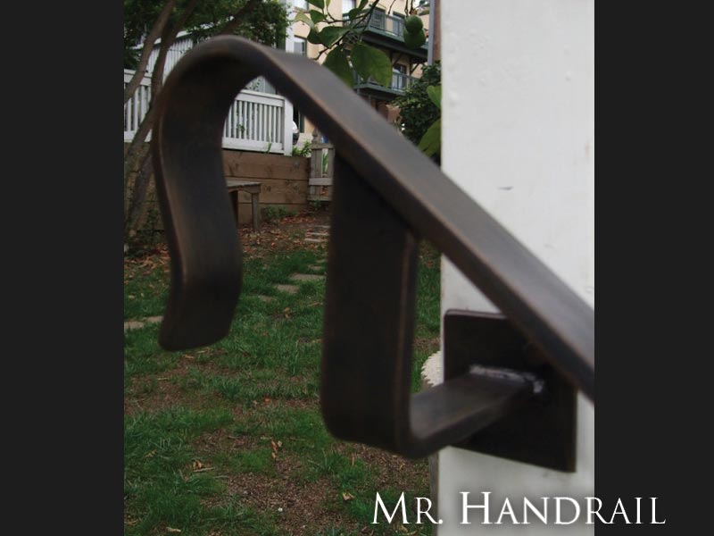 (CU-17) - Bronze patina on a handrail bracket