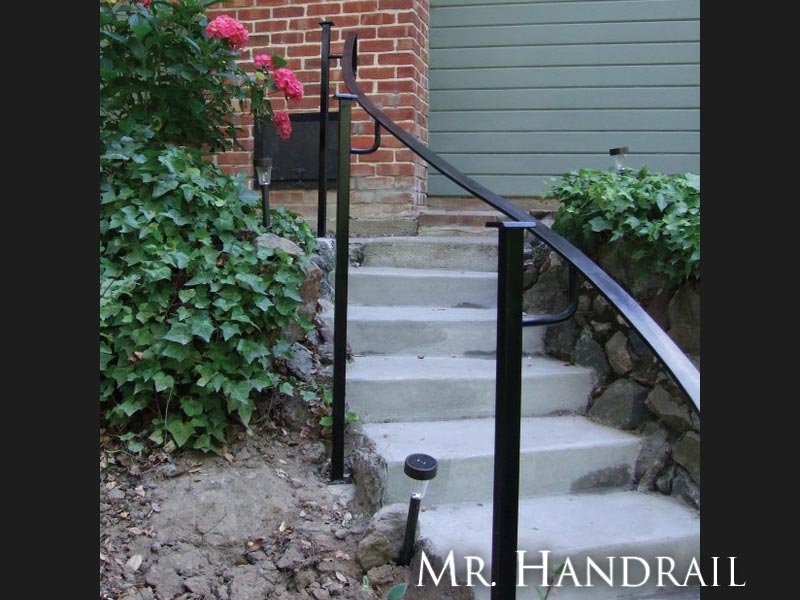 (EX-19) - Sample of handrail mounted at side of stair and then top cap bracketed over to compensate for narrow stair