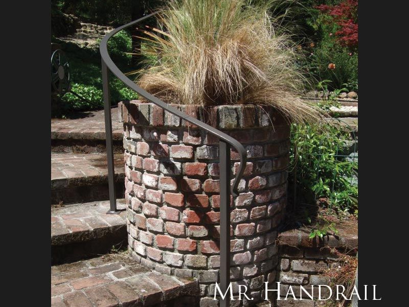 (EX-59) - Formed around planter painted an anodized bronze