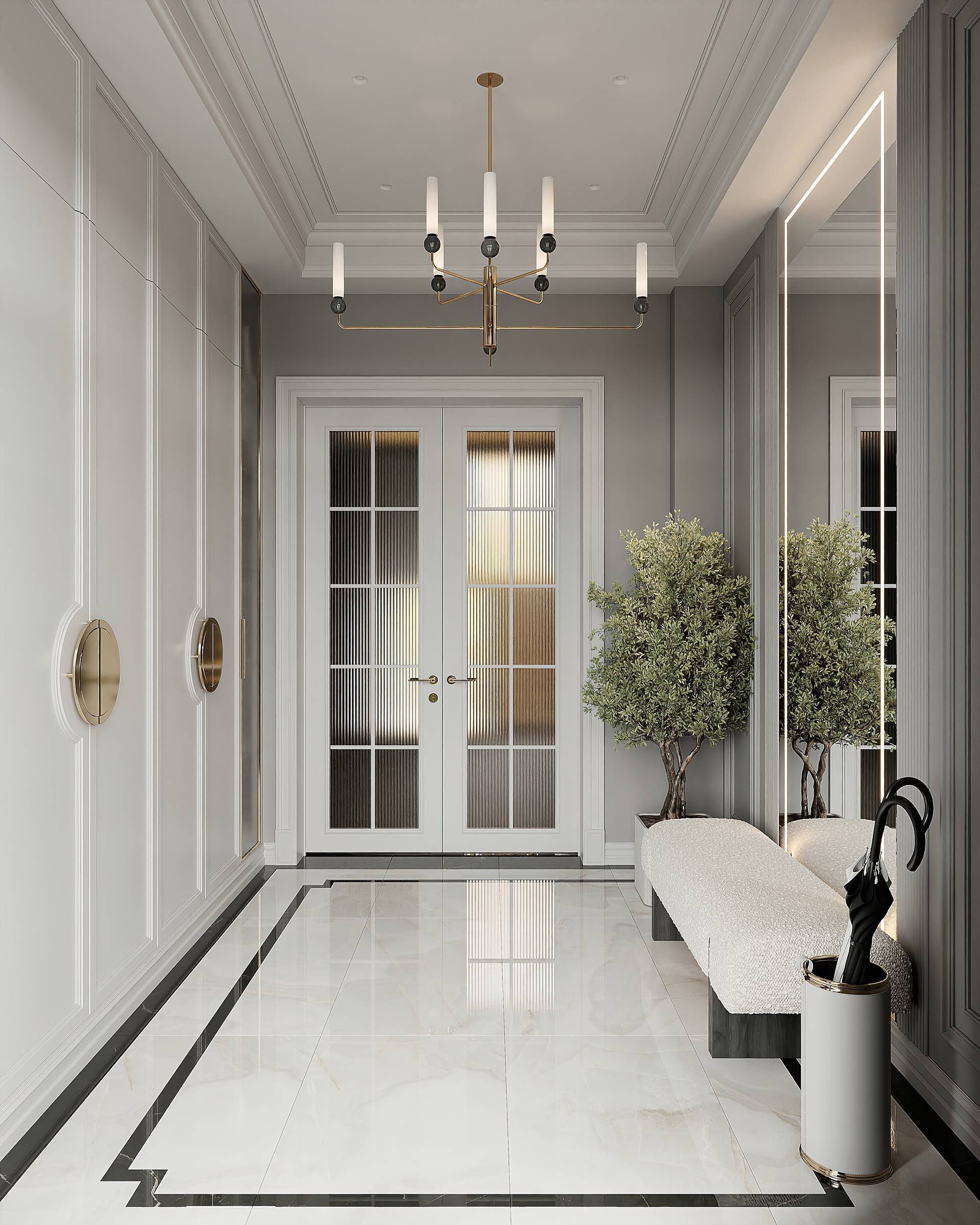 A hallway with a bench , mirror , and umbrella holder.