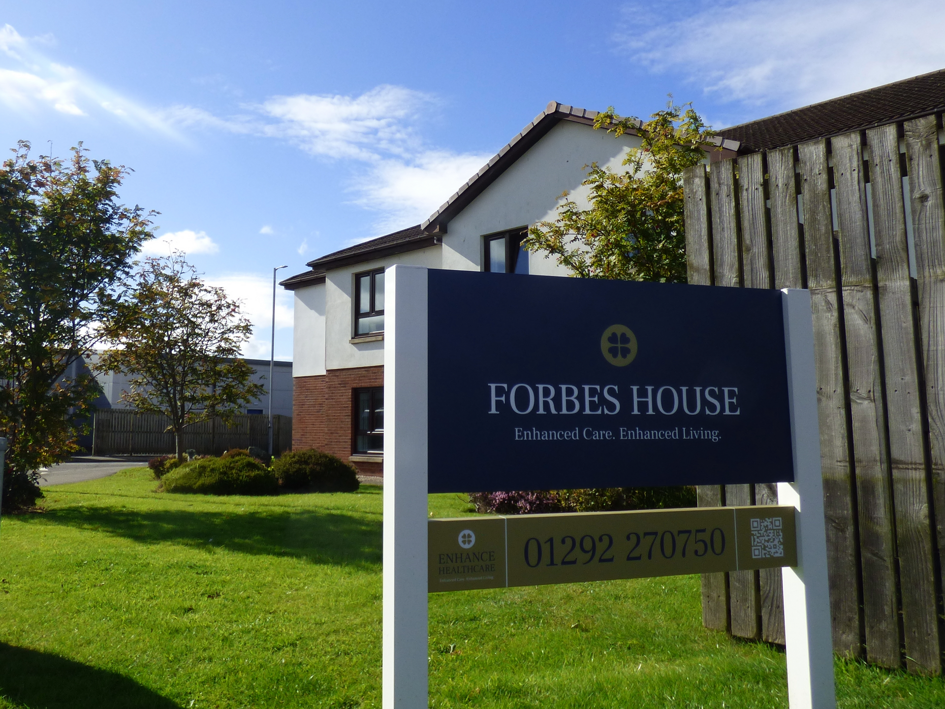 A forbes house sign in front of Care Home