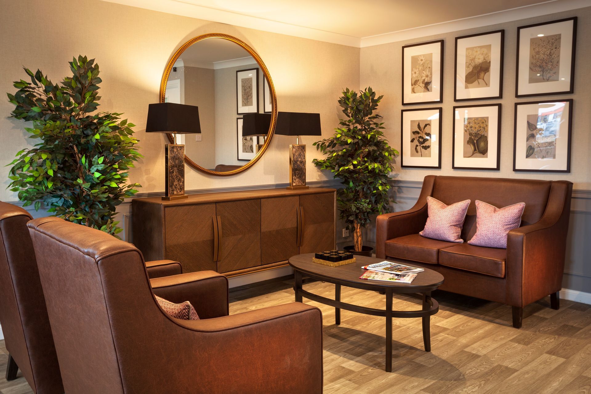 Dining room with several tables, chairs, and windows. Some tables have place settings. The room has neutral colors.