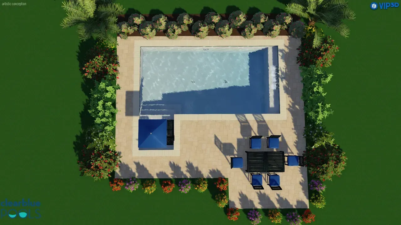 An aerial view of a swimming pool with a table and chairs surrounded by trees.