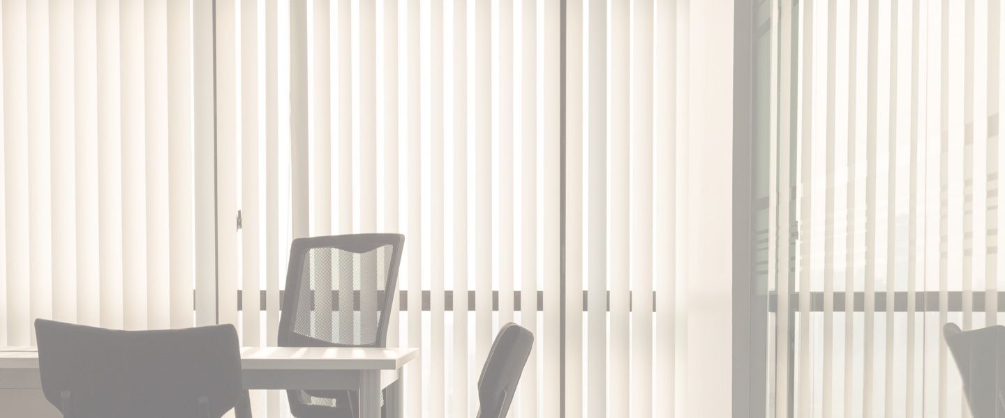 An Office With Blinds On The Windows — Ron Ayton Curtains, Blinds & Shutters In Shelly Beach, NSW
