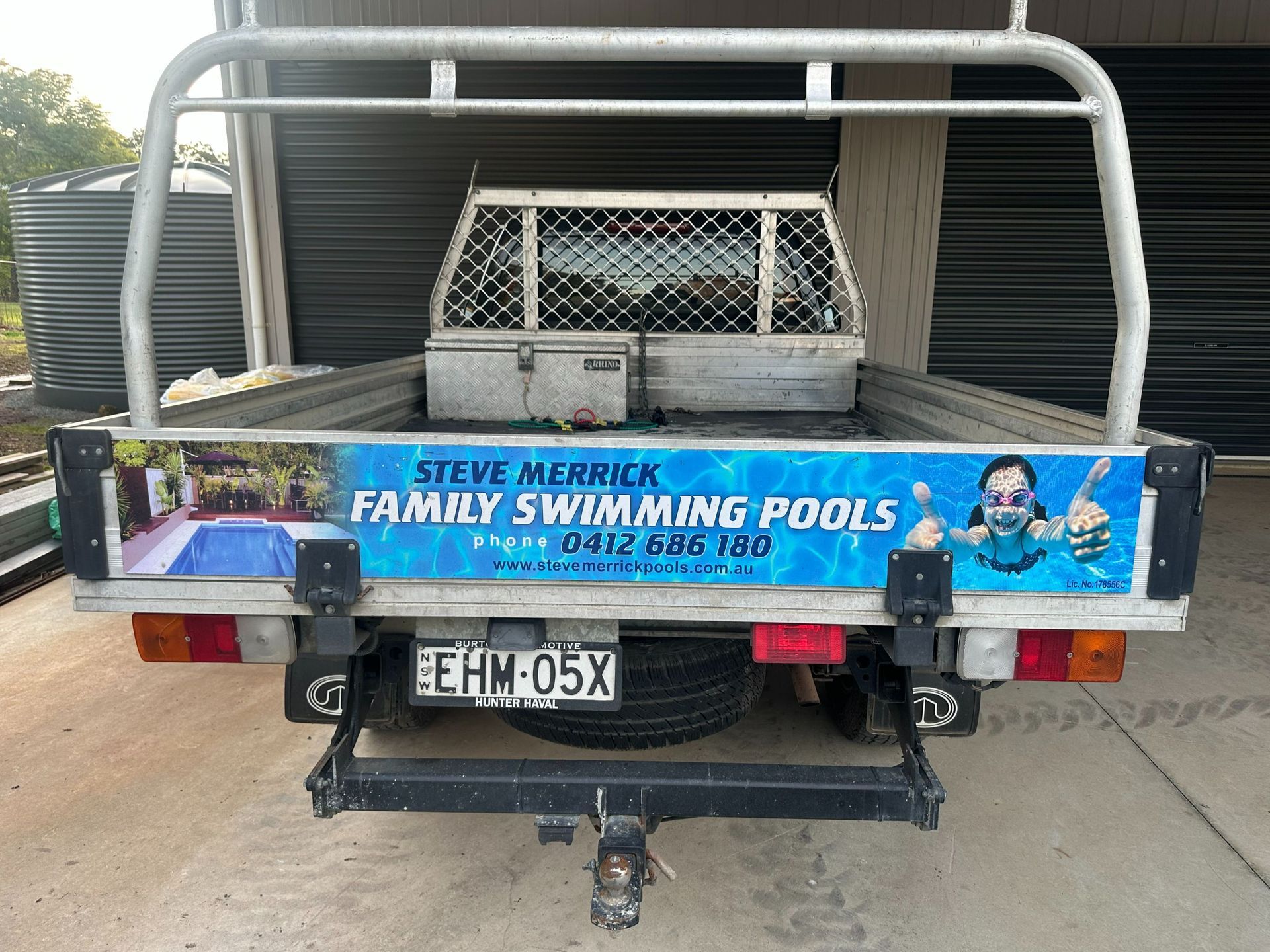 Steve Merrick Family Swimming Pools is Advertised on the Side of a Car — Steve Merrick Family Swimming Pools in Failford, NSW