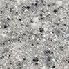 A close up of a gray granite texture with black spots. — Steve Merrick Family Swimming Pools in Failford, NSW