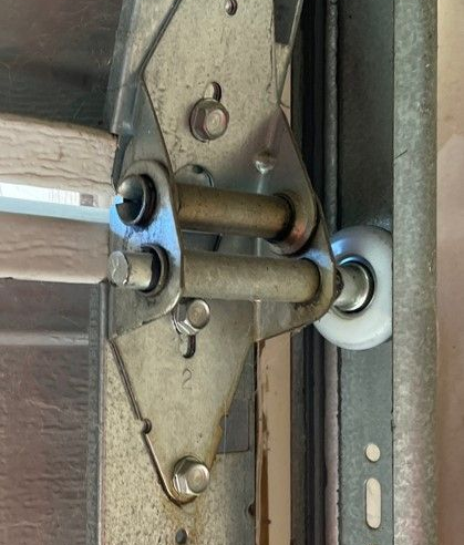 Garage door rollers closeup shot