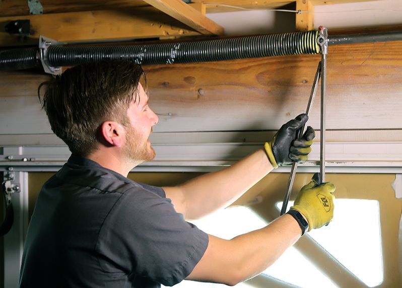 garage door repair technician working in hutto tx