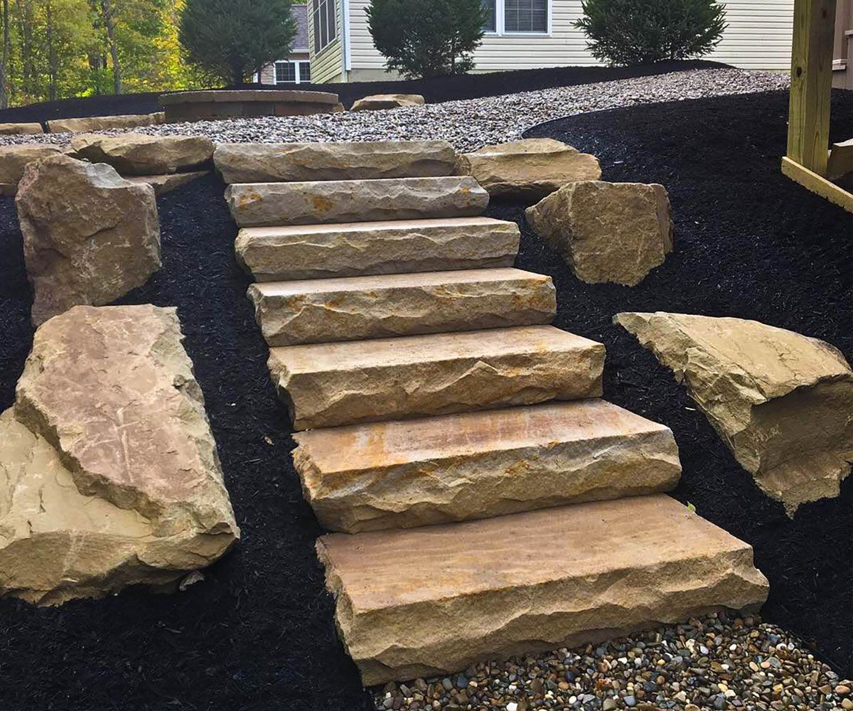 Ohio sandstone large natural landscape stone steps on Fairlawn, Ohio hill backyard