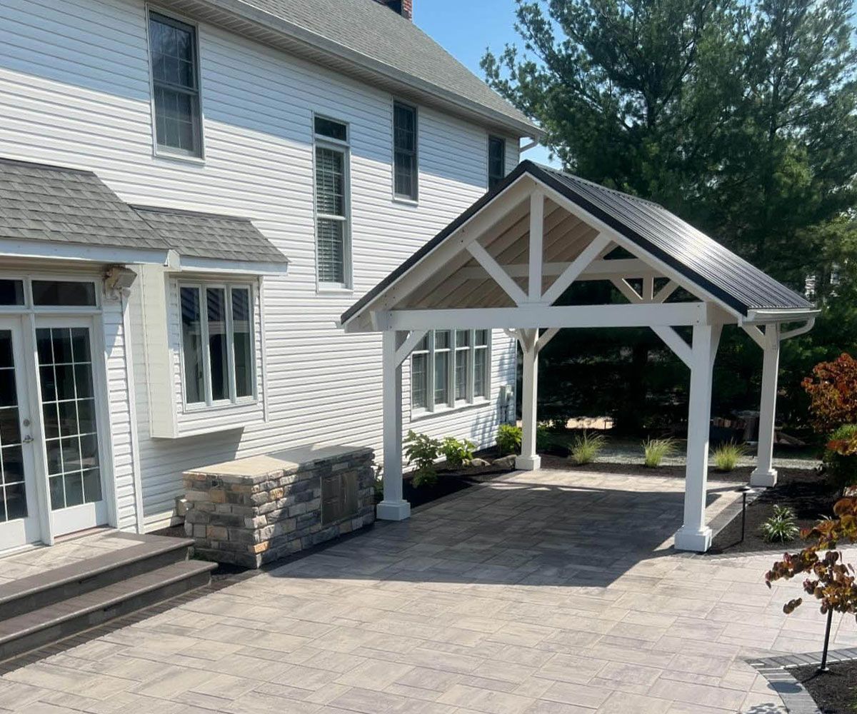 Custom built backyard pavilion of Medina, OH home designed and installed by Chidsey Landscape and Design
