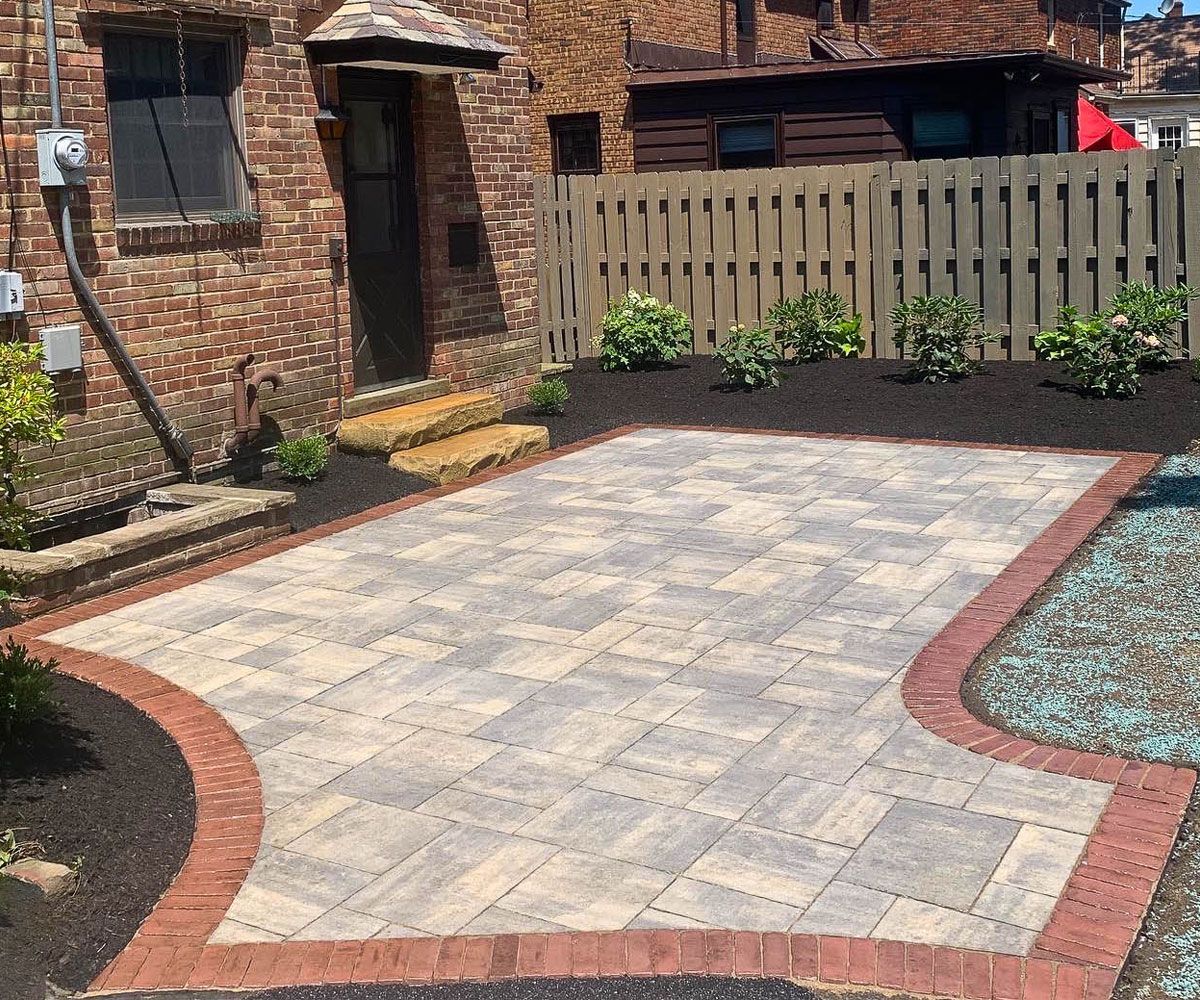 Abstract paver patio design and installation in Copley, Ohio home by Chidsey Landscape & Design