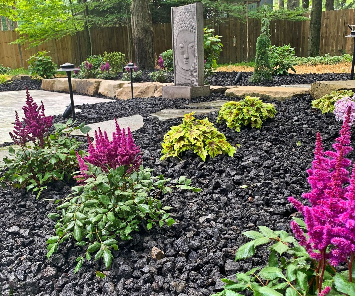 Cuyahoga County Ohio garden with softscape planting landscape and natural landscape outcroppings that provide a sensory experience.