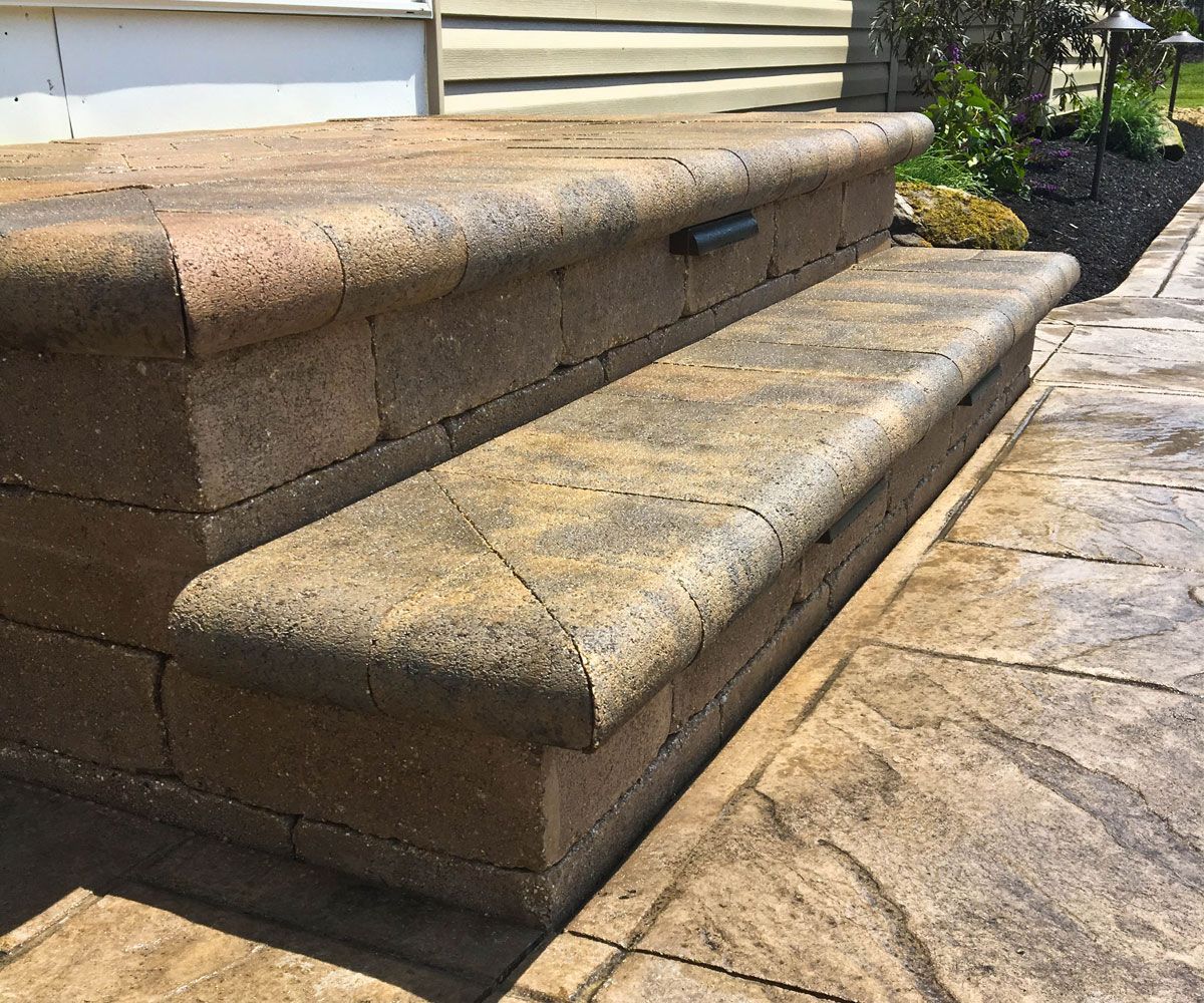 Cobblestone front walkway of Bath, Ohio house designed and installed by Chidsey Landscape & Design