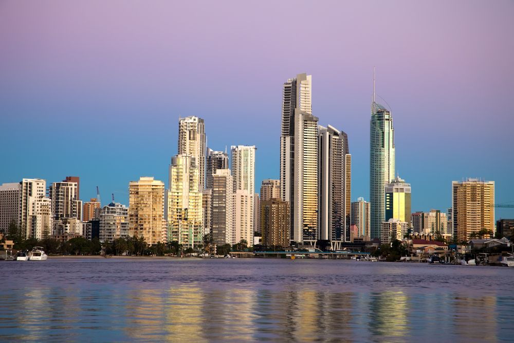 Gold Coast City Skyline With a Body of Water in the Foreground — Encore Carpet Professionals in Gold Coast, QLD