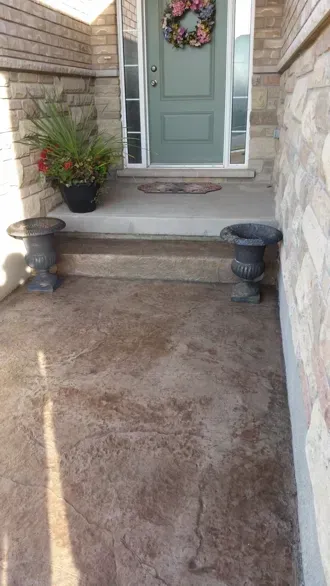 There is a wreath on the door of the house.