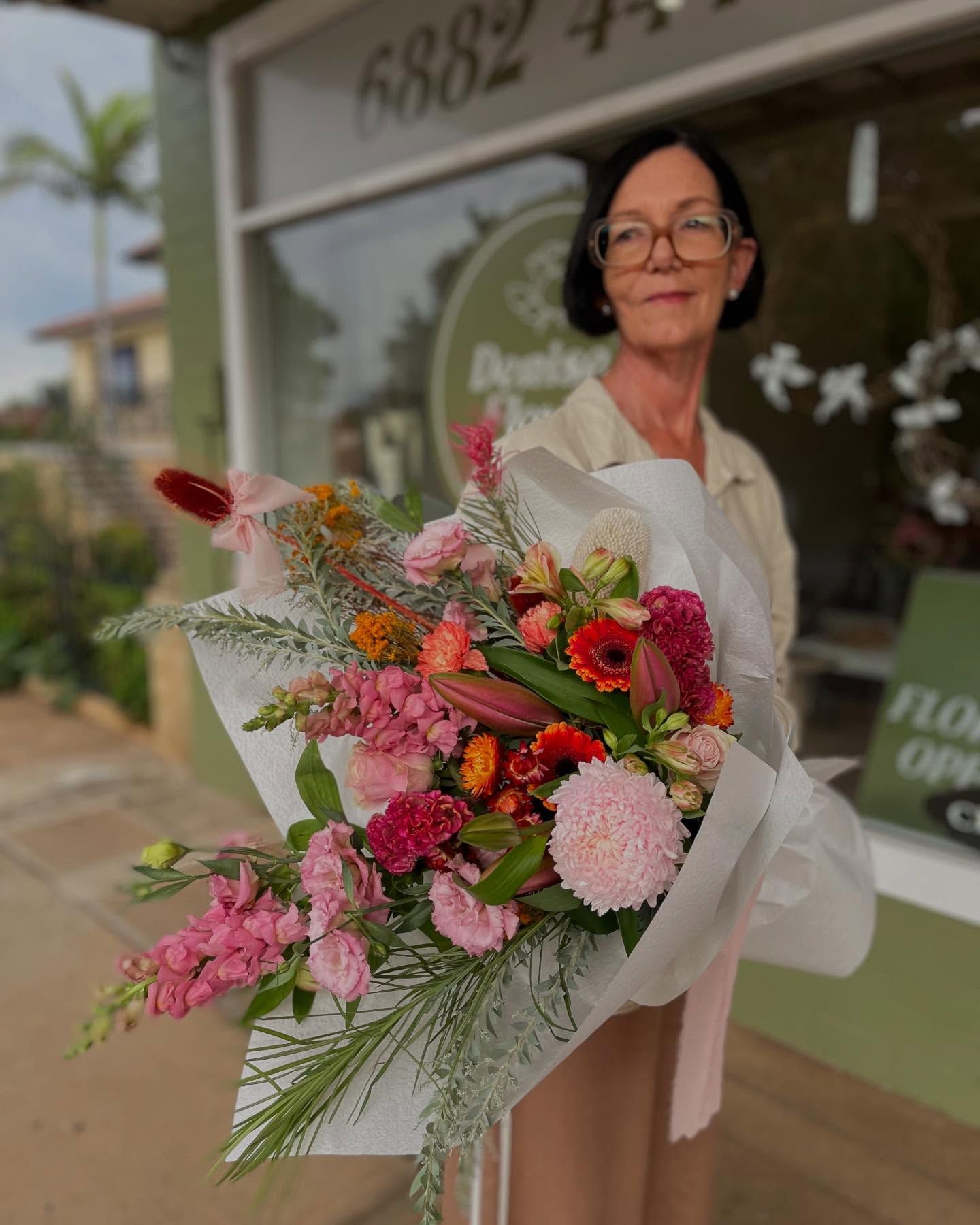 Woman Holding Colorful Flower Bouquet — Denise's Flower Studio In Wellington, NSW