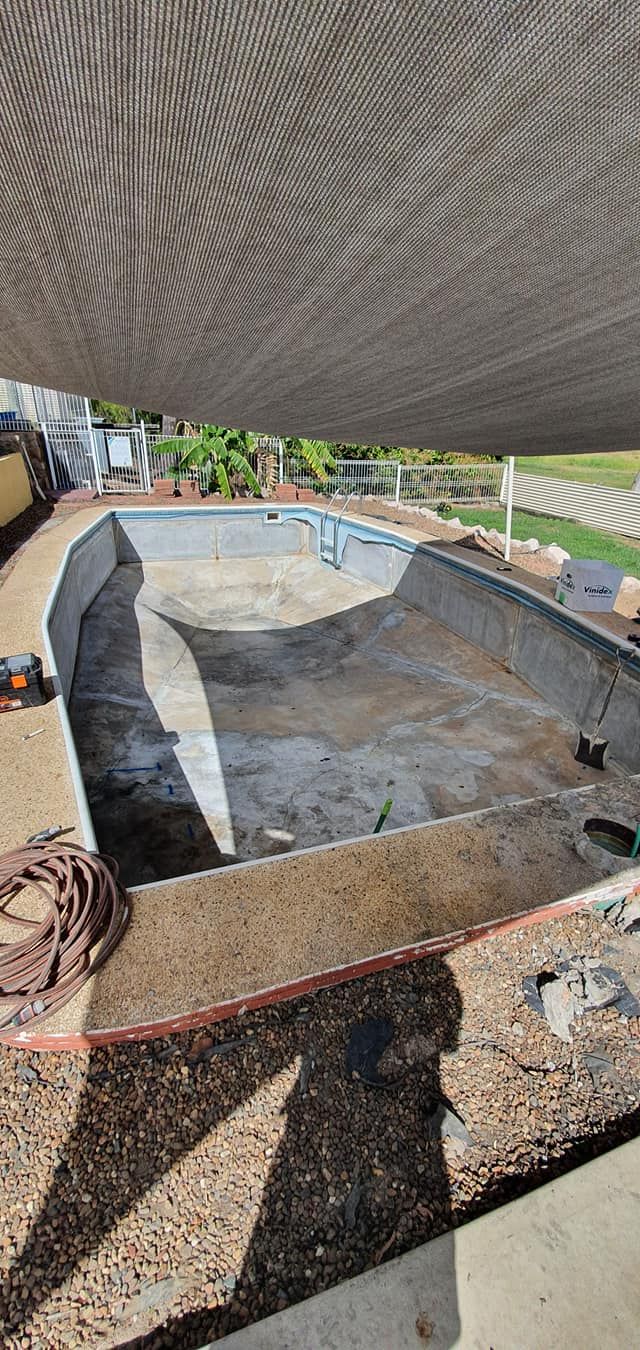 A Skateboard Park is Being Built Next to a Swimming Pool — NQ Tropical Pools & Renovations in Airlie Beach, QLD