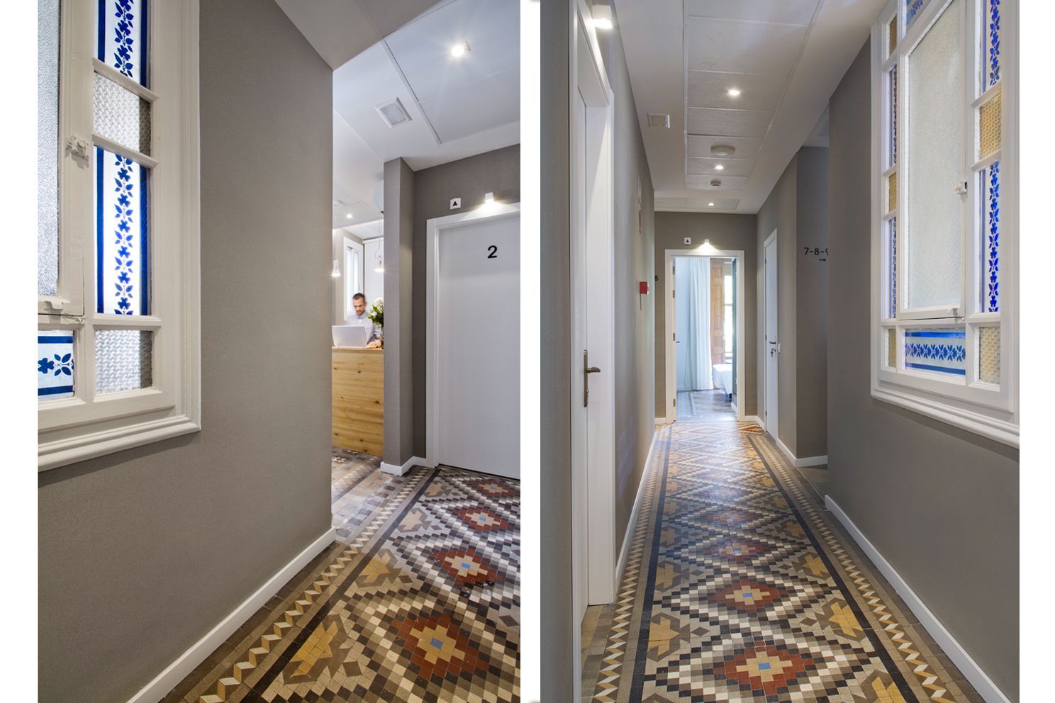 Un pasillo con suelo de baldosas estampadas en forma de diamante, paredes grises .