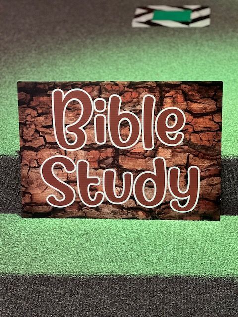A sign that says bible study on it