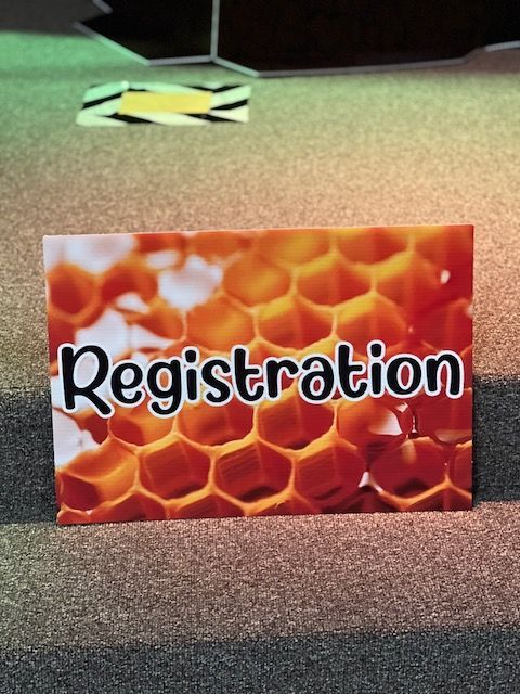 A sign that has the word registration on it