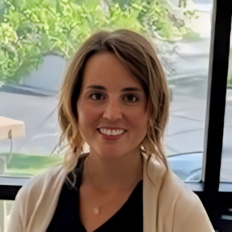 Silhouette of a person with a head covering within a gray circle.
