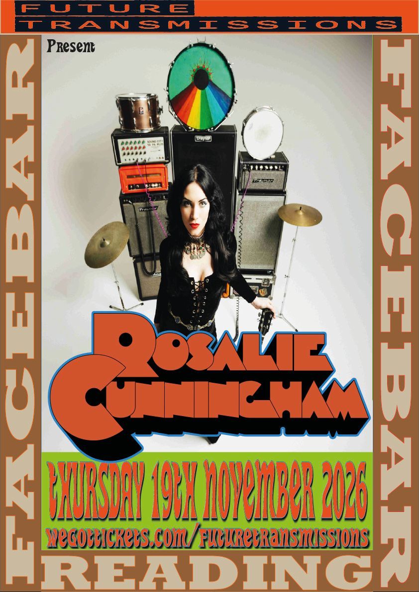 Picture of Rosalie in front of guitar amp