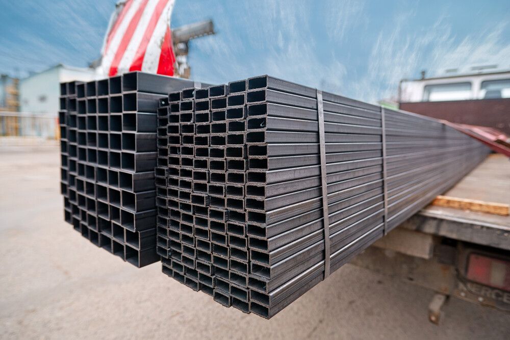 A Stack Of Metal Pipes — Dalrymple Sheet Metal In Mackay, QLD