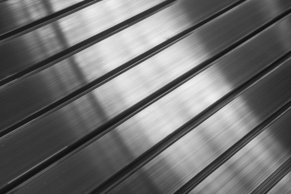 A Close Up Of A Shiny Stainless Steel Surface — Dalrymple Sheet Metal In Garbutt, QLD