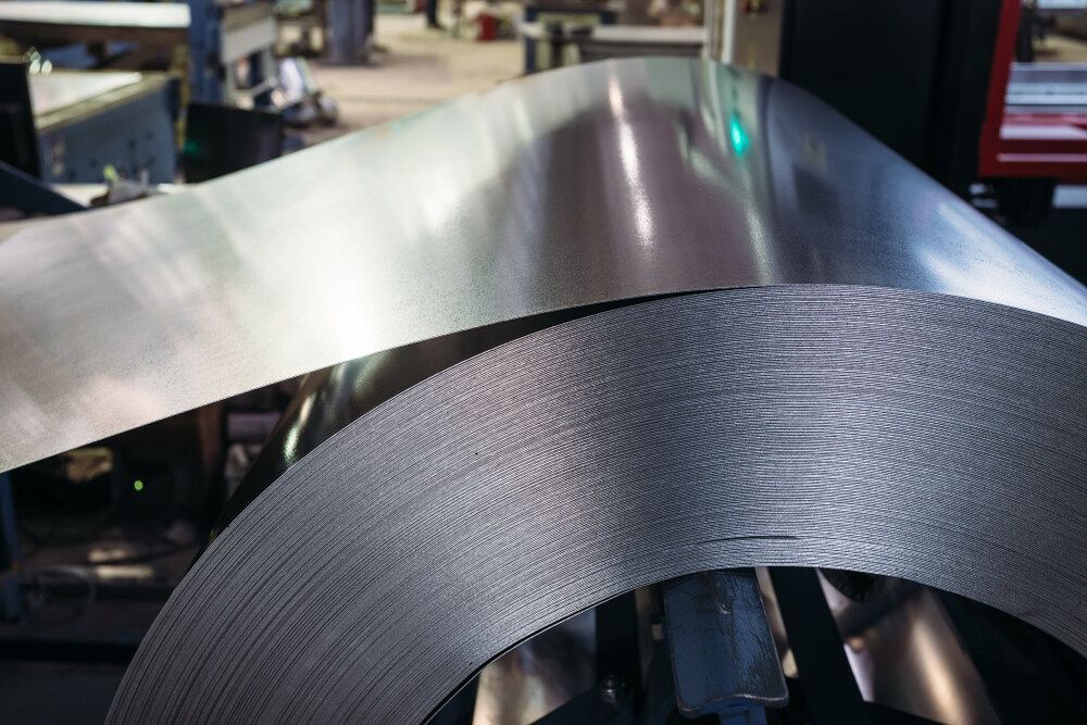 A Close Up Of A Metal Coil In A Factory — Dalrymple Sheet Metal In Garbutt, QLD