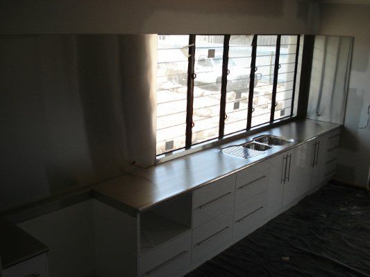 A Kitchen With A Sink And A Large Window — Dalrymple Sheet Metal In Garbutt, QLD