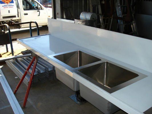 A Kitchen Counter With Two Sinks — Dalrymple Sheet Metal In Garbutt, QLD
