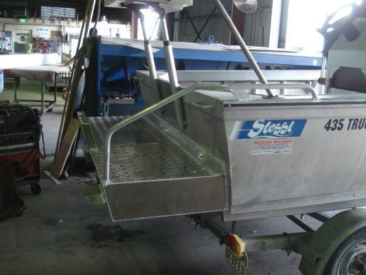 A Silver Boat On A Trailer That Says 435 On It — Dalrymple Sheet Metal In Townsville, QLD