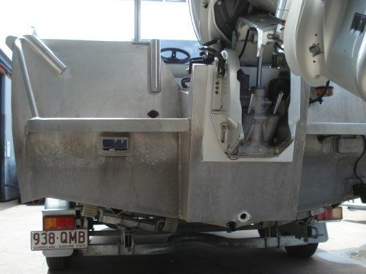 A Boat With A License Plate That Says 938 Qmb — Dalrymple Sheet Metal In Garbutt, QLD
