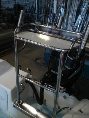 A Stainless Steel Ladder Is Attached To The Back Of A Boat — Dalrymple Sheet Metal In Garbutt, QLD