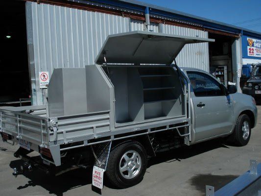 A Silver Truck With A Canopy — Dalrymple Sheet Metal In Garbutt, QLD