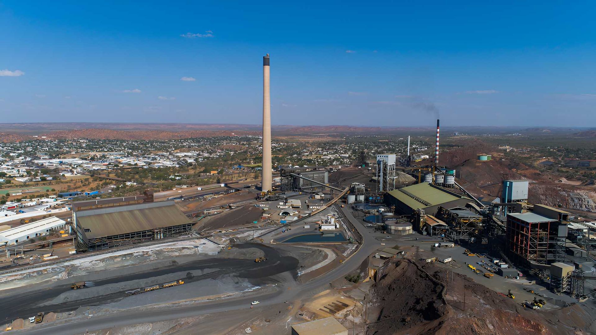 An Aerial View Of A Coal Mine With A Large Chimney — Dalrymple Sheet Metal In Mount Isa, QLD