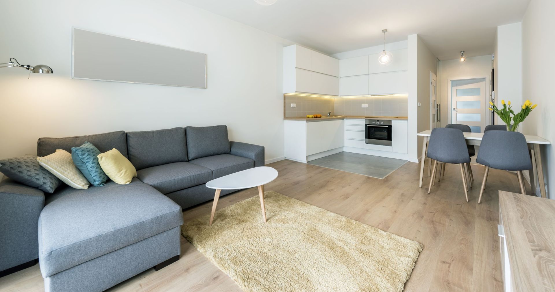 Aerial view of a suburban neighborhood with houses, pools, and roads winding through.