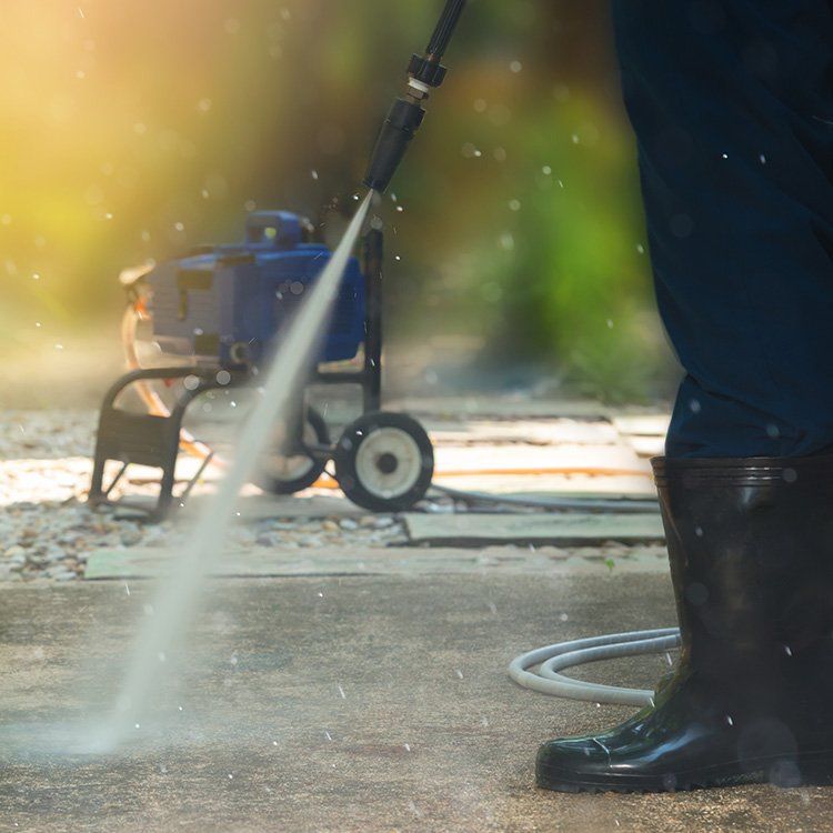 Cleaning Pathway With High Pressure Washer — Pressure Washers In Bowen, QLD