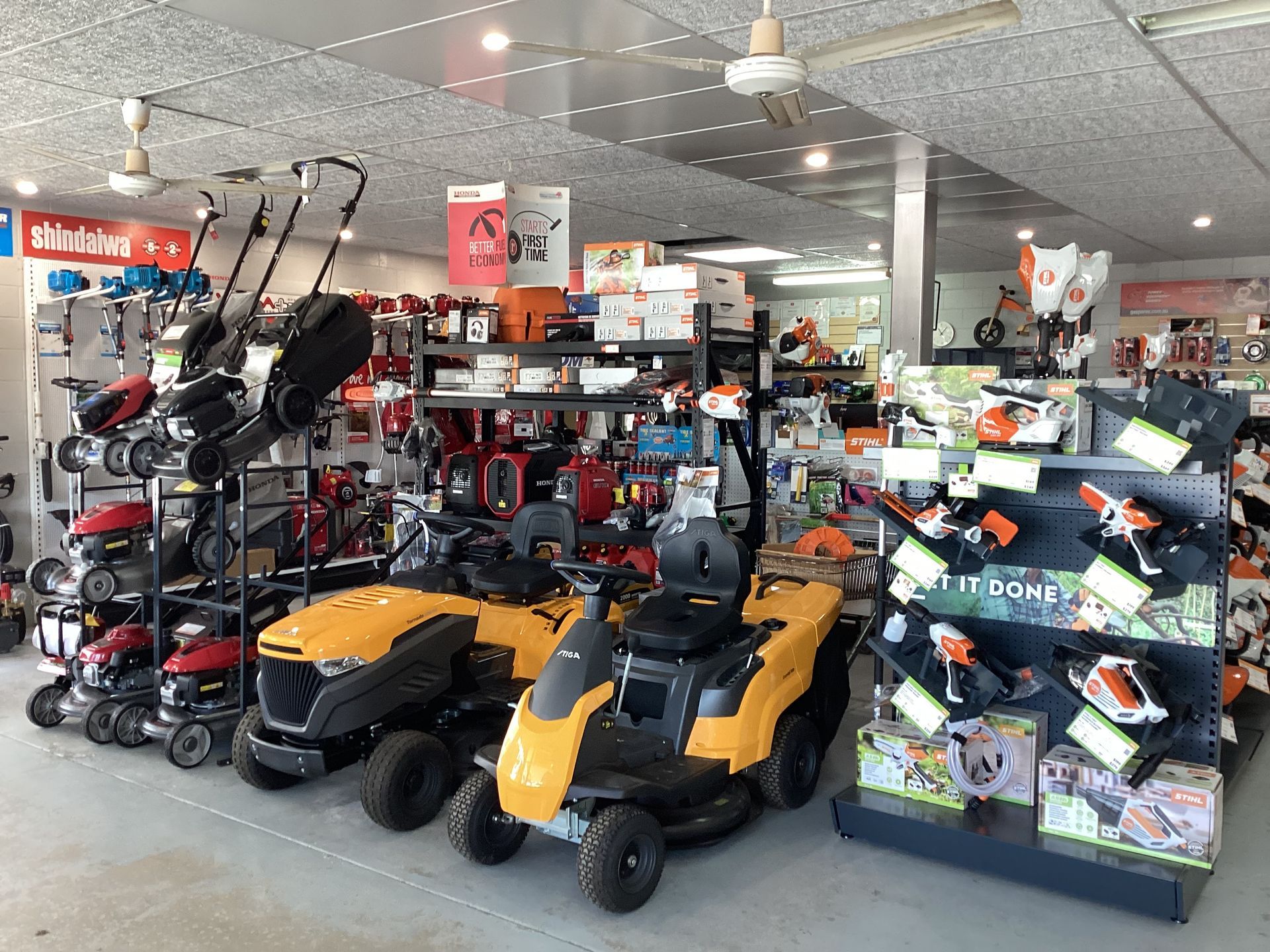 Green Push Lawnmower with Brushcutter — Lawn Mowers In Bowen QLD